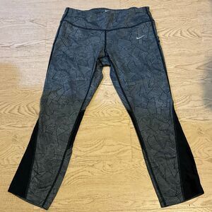 Nike Dri-FIT Capri running leggings with a black and gray geometric print and me